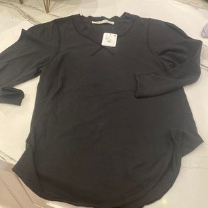 We the free AXs top NWT